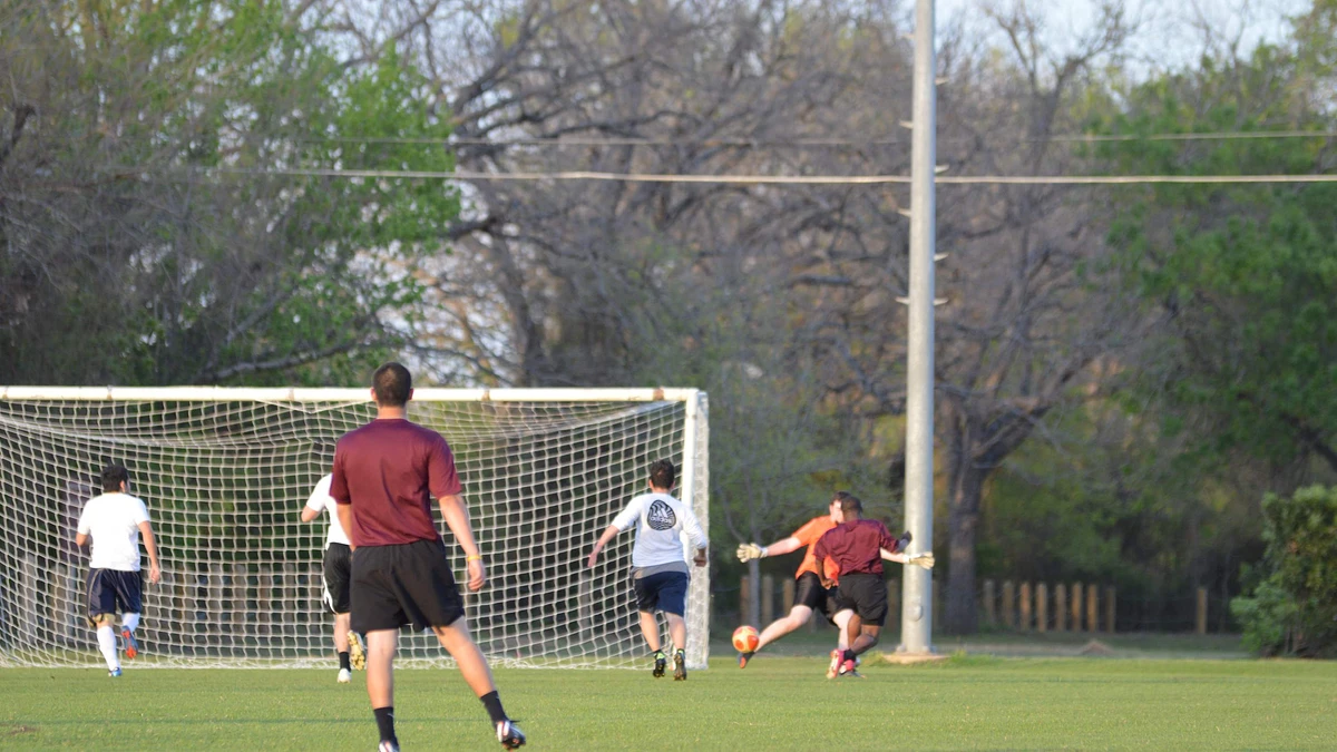 men playing soccer on the soccer field