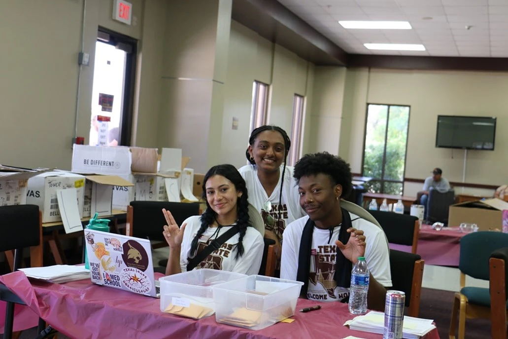 Resident Assistants Sitting at a Table